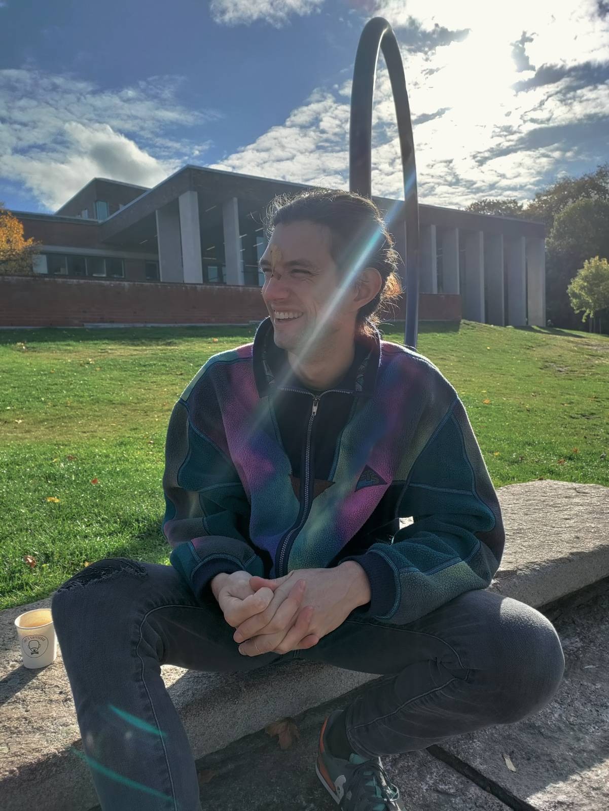 photo of Bill in front of GU's Humanisten building